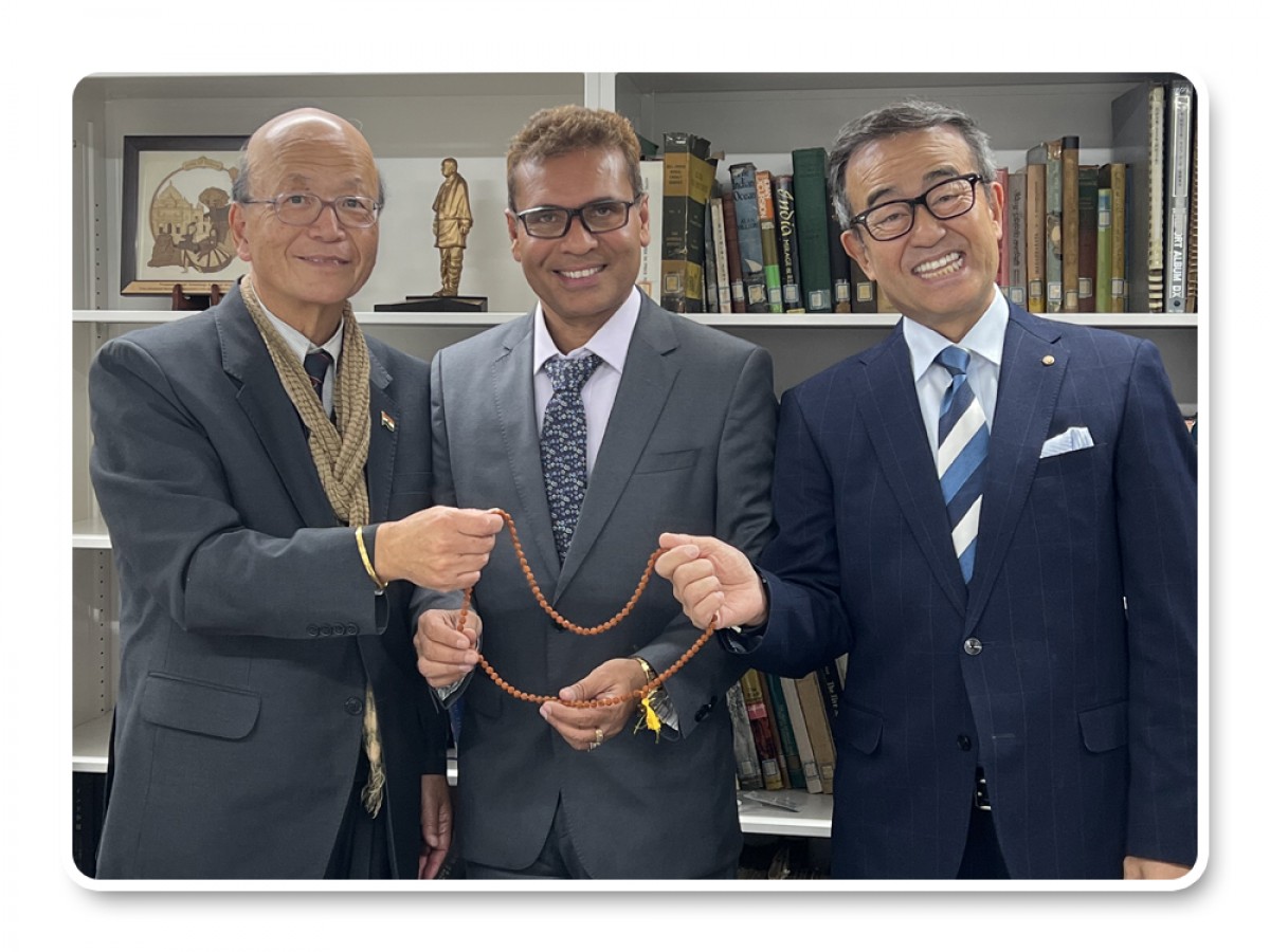 Japan India Association Director receives the holy Rudraksha Mala Himalaya.  A tocken of love